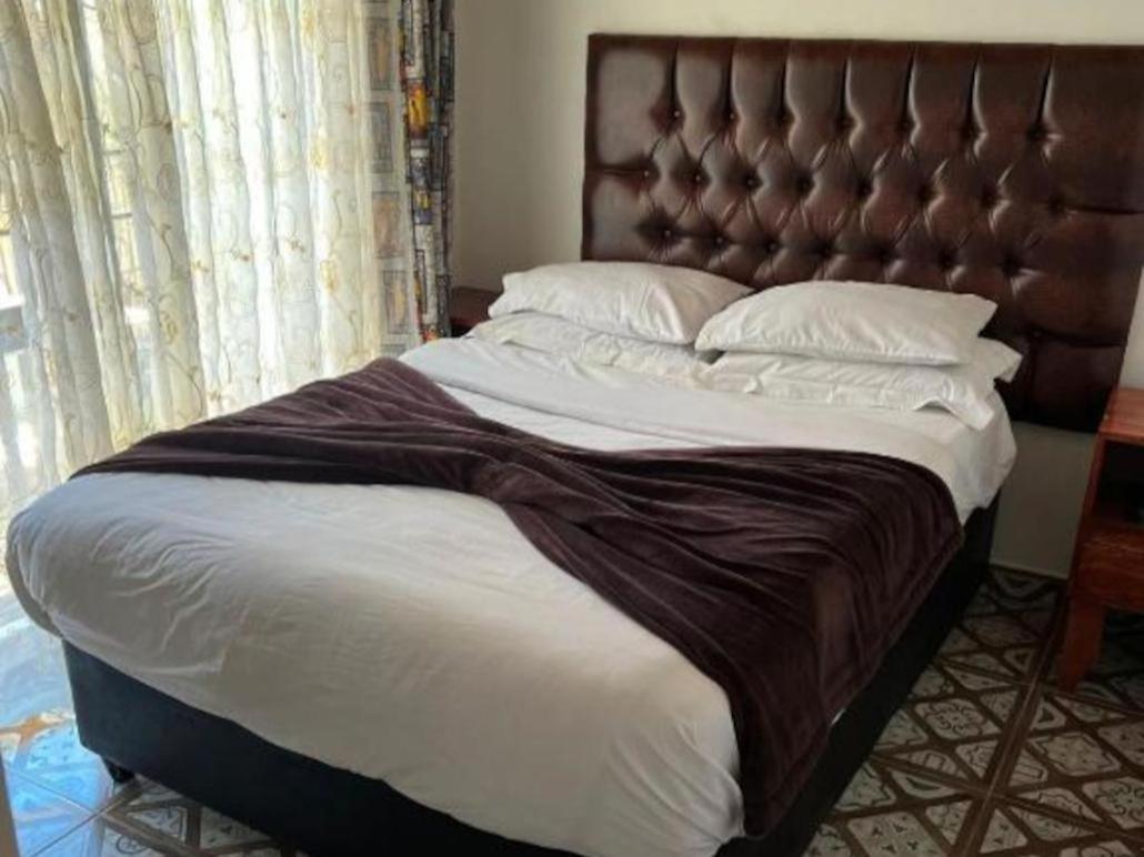 בלוויל Victoria Guest Lodge חדר תמונה